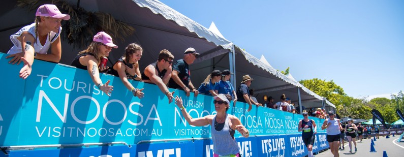 finish run highfive spectators header 2